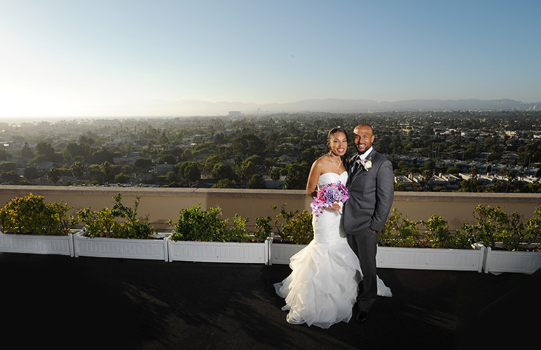 Whitney and Curtis are photographed on their wedding day on the roof top patio of the Marina Del Rey Marriott in Marina Del Rey, CA on 9/5/15.